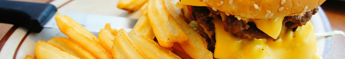 Eating American (Traditional) Burger Deli Sandwich at Big Boy Submarine restaurant in Chicago Heights, IL.